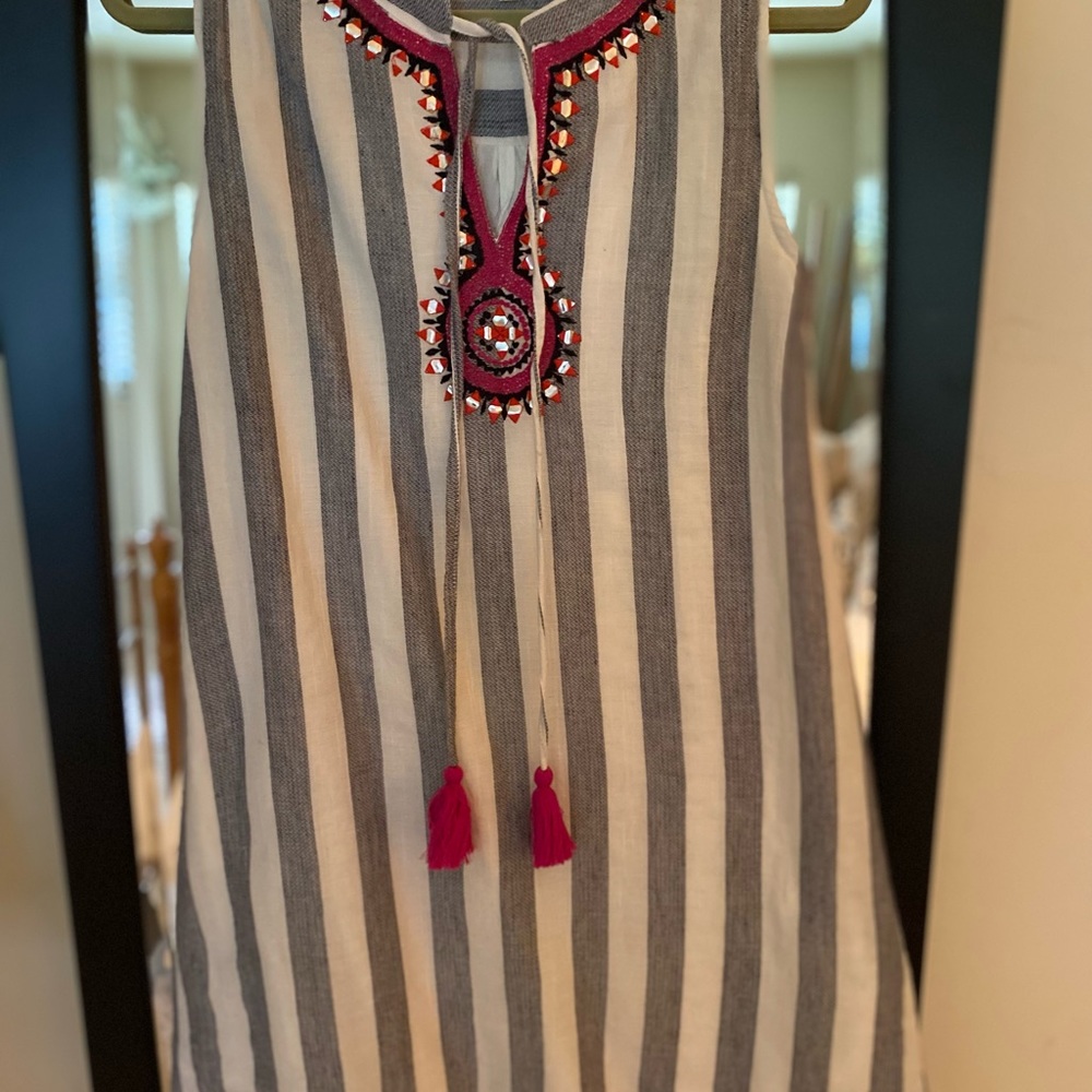 Perfect condition. Fun dress or cover up. Very lightly worn